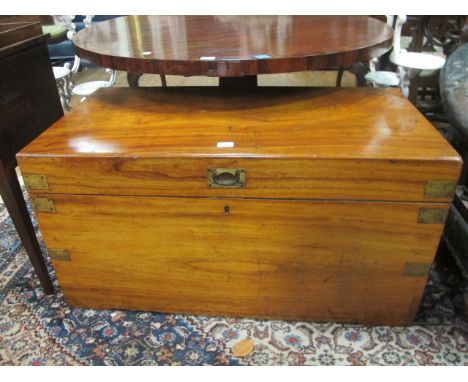 A CAMFERWOOD TRUNK with a brass inset handle and straps 55cm (h) x 107cm (w) x 56cm (d)