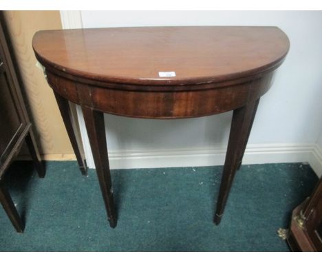 AN EDWARDIAN MAHOGANY D-SHAPED TEA TABLE on square tapering legs 73cm (h) x 92cm (w) x 46cm (d)