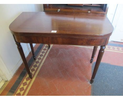 A GEORGIAN MAHOGANY SIDE TABLE with turned legs 91cm wide