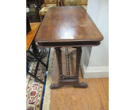 A LATE VICTORIAN RECTANGULAR OCCASIONAL TABLE on twin pillar supports 89cm wide