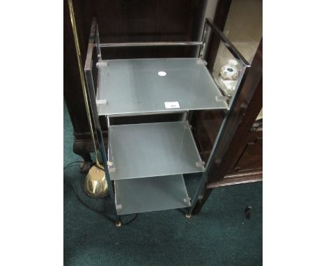 A CHROME THREE TIER WHATNOT together with a brass adjustable standing lamp