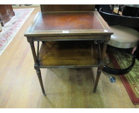 AN AMERICAN MAHOGANY TWO TIER OCCASIONAL TABLE with red leather inset top 69cm (h) x 56cm (w) x 46cm (d)