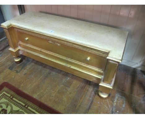 A VICTORIAN STYLE GILTWOOD TABLE of inverted breakfront outline surmounted with a vein marble top with freize drawer on turne