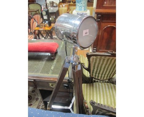 A CHROME AND HARDWOOD FLOOR STANDARD LAMP on telescopic tripod base