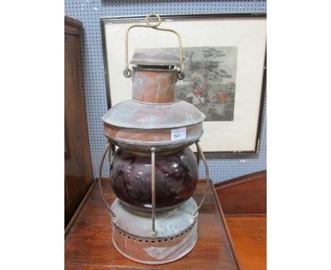 A GOOD VICTORIAN COPPER SHIPS LAMP with red glass shade