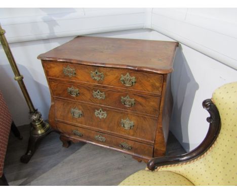 A 19th Century walnut commode chest of four drawers, veneer and handle missing, 82cm x 82cm