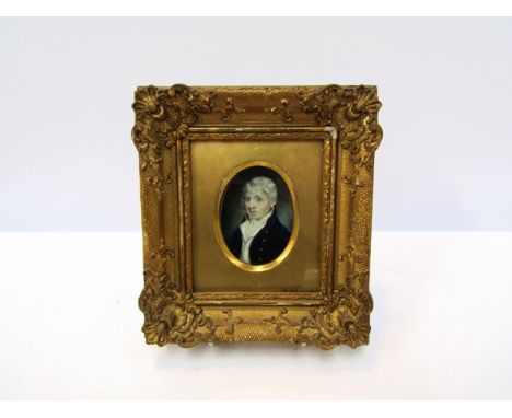 A 19th Century miniature portrait on ivory of gentleman in blue jacket, classical frame, 7cm tall