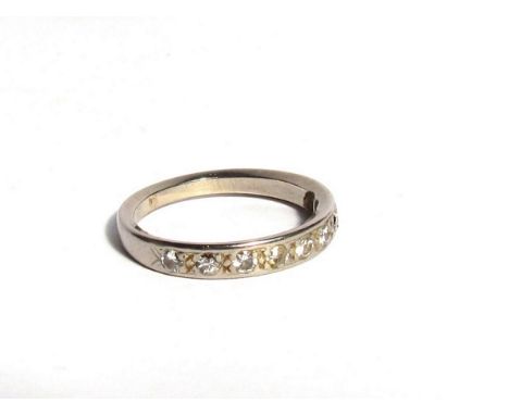 An 18ct white gold and diamond half hoop eternity ring, size O, 4g