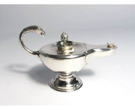 A silver Stokes &amp; Ireland Aladdin lamp table lighter, Chester 1930, 9.5cm long