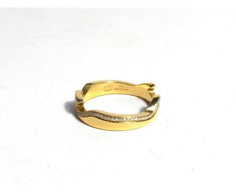 A Georg Jensen designer 18ct gold ring set with a border of diamonds, size N