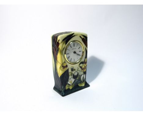 A Moorcroft Lamia pattern clock, designed by Rachel Bishop, 16cm tall