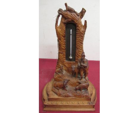Early 20th C Black Forest desk thermometer, carved with a Tyrolean shepherd and his flock, H24cm 