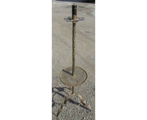 Wrought metal hammered finish standard lamp, with circular tier, on three out scrolled supports 