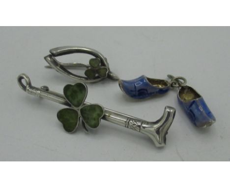 Pair of silver and blue enamel Dutch clog charms stamped 835, silver riding crop bar brooch set with an agate Shamrock stampe