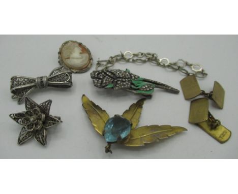 Sterling silver gilt and blue stone leaf spray brooch, a silver bracelet, and a French silver enamel and simulated diamond br
