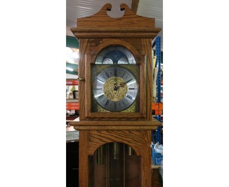 Hermle 8 day Westminster long case clock, in seasoned selected oak case, with triple weight driven Westminster quarter chimin