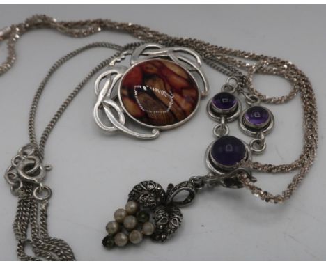 Silver necklace set with three amethysts, a marcasite pendant in the style of grape bunch, silver chain stamped 925 and an Ar