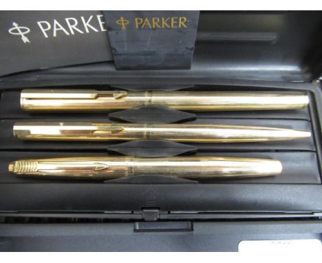 Two Parker cased pen sets, shells, two Corgi die-cast model vehicles, commemorative crowns, and pre decimal coinage 