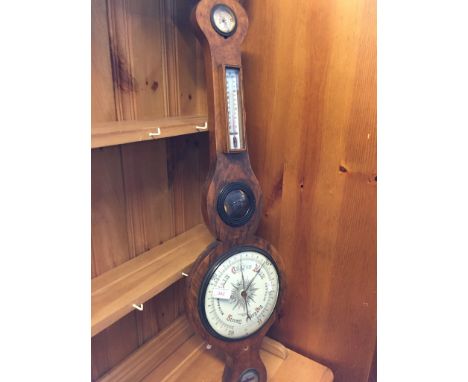 WALNUT MERCURIAL WHEEL BAROMETER. 94CM