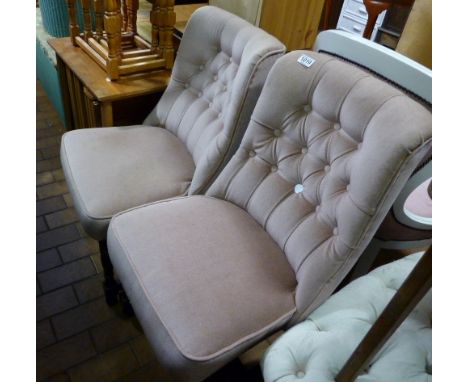 Pair of upholstered button back chairs