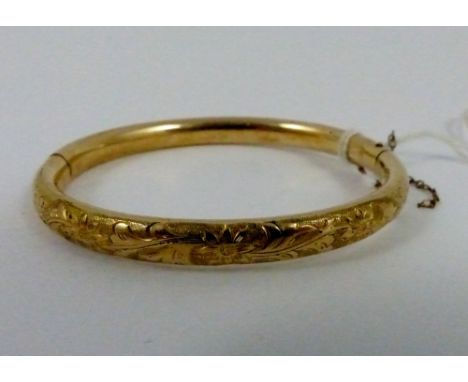 9ct gold ladies hinged bangle, tested as gold, 13g