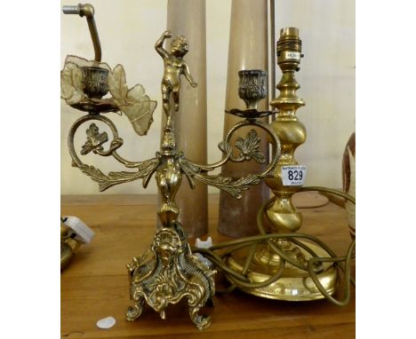 Brass early 20th Century cherub two arm candelabra and a brass lamp