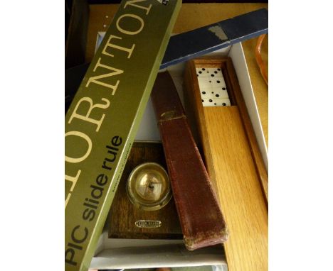 Antique Ever Ready lamp, three slide rules in cases and box of dominoes