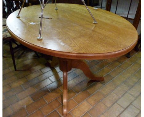 Light oak oval dining table on tripod base, 120 x 88cm