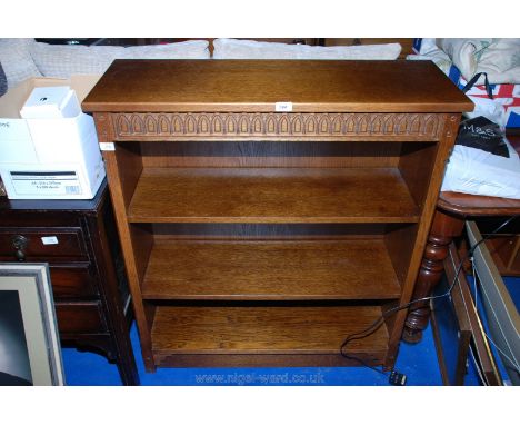 An Oak three-shelf bookcase/display unit, 36" x 13" x 40" high.