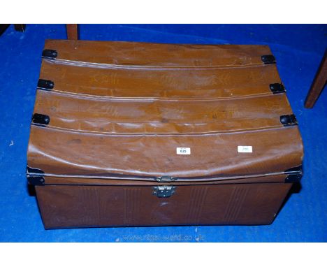 A metal travel trunk 30" x 21" x !8" high.