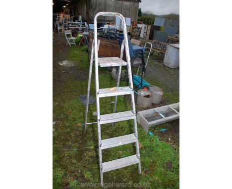 A four rung step ladder.