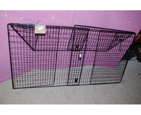 A metal fireguard 50'' long x 13'' deep x 26'' high.