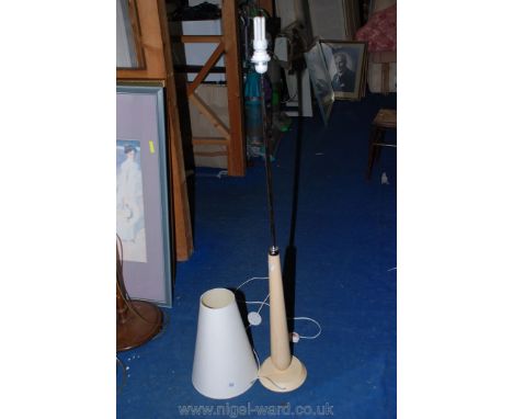 A modern floor lamp with shade a/f.