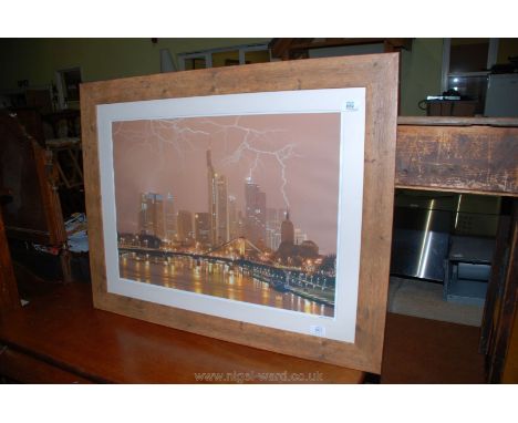 A glazed print of a lightning strike over lofty high-rise city buildings 32" x 24". 