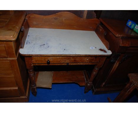 A "Melamine" topped Pine wash stand with drawer and lower pot-shelf, 30" x 18" x 36" high.