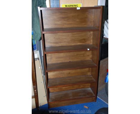 A dark-wood floor-standing five shelf bookcase/display stand, 32" x 10" x 60" high.