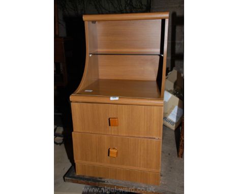 A two-drawer bedside chest with glass shelf.