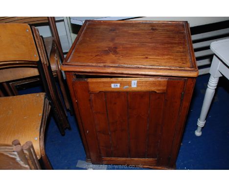 A Pine plank-style single-door, three shelf cupboard, 22" x 17 1/2" x 31" high.