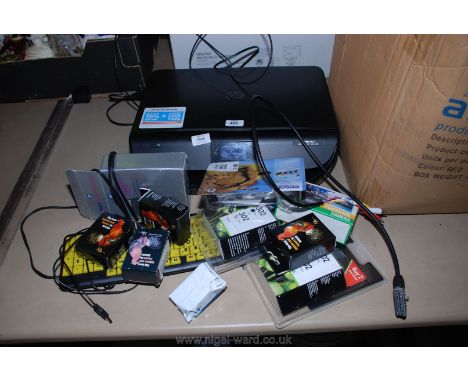 An "H.P." printer, ink cartridges, a camera, etc.,