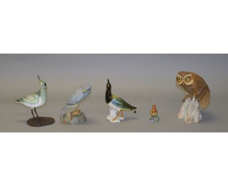 An Albany Worcester porcelain bird on metal legs and base, height 21cm, together with two Spode bird figures, a Royal Worcest