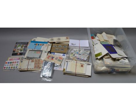A large mixed lot of assorted First Day Covers, stamps and related ephemera