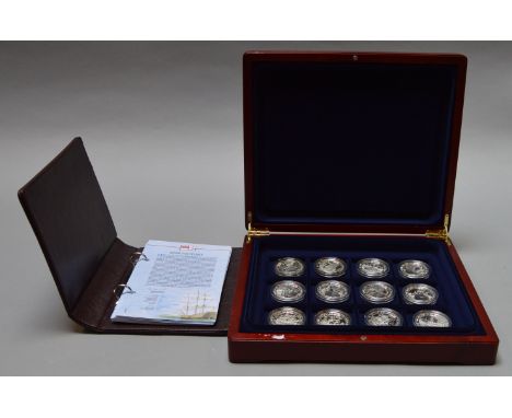 London Mint "The History Of The Royal Navy Collection" cased set of 12 coins, includes certificates in binder.