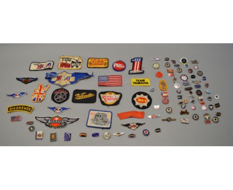 Collection of assorted enamel badges and similar, mostly Motorbike related including BSA, Harley- Davidson, Ariel etc togethe