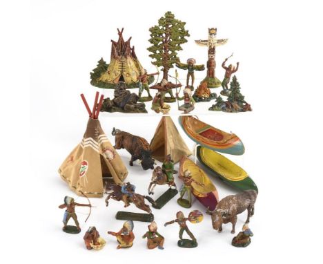 Konvolut Indianerfiguren mit Zelten und Booten. Elastolin, O. &amp; M. Hausser. Teils gemarkt.             Masse, farbig bema