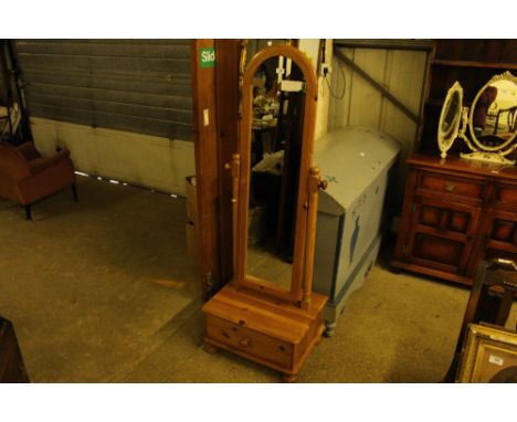 A modern pine cheval mirror fitted single drawer below