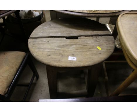 A rustic pine stool