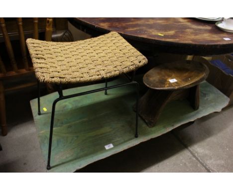 A small rustic stool and a string top stool