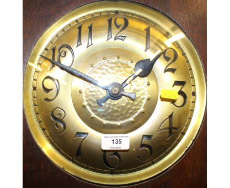 An Art Deco oak long cased clock