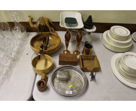 A set of kitchen scales and weights; a carved wooden camel ornament; turned wooden bowls; a pair of copper spill vases etc.