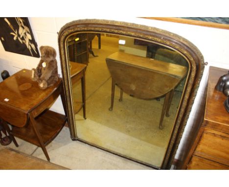 A Victorian gilt and faux rosewood overmantel mirror